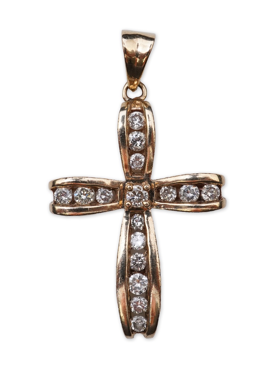 A diamond cross pendant